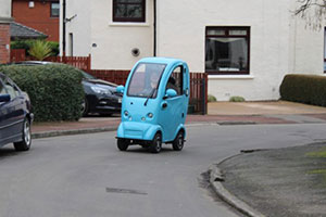 mobility solutions cabin car on road