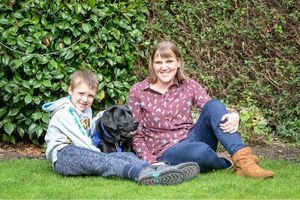 support dog with family