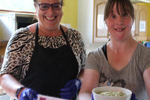 Social care staff at community soup event