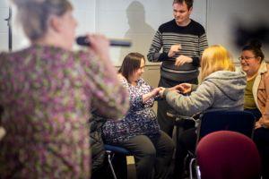 service users participating in karaoke