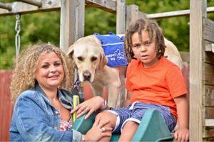 support dog with family